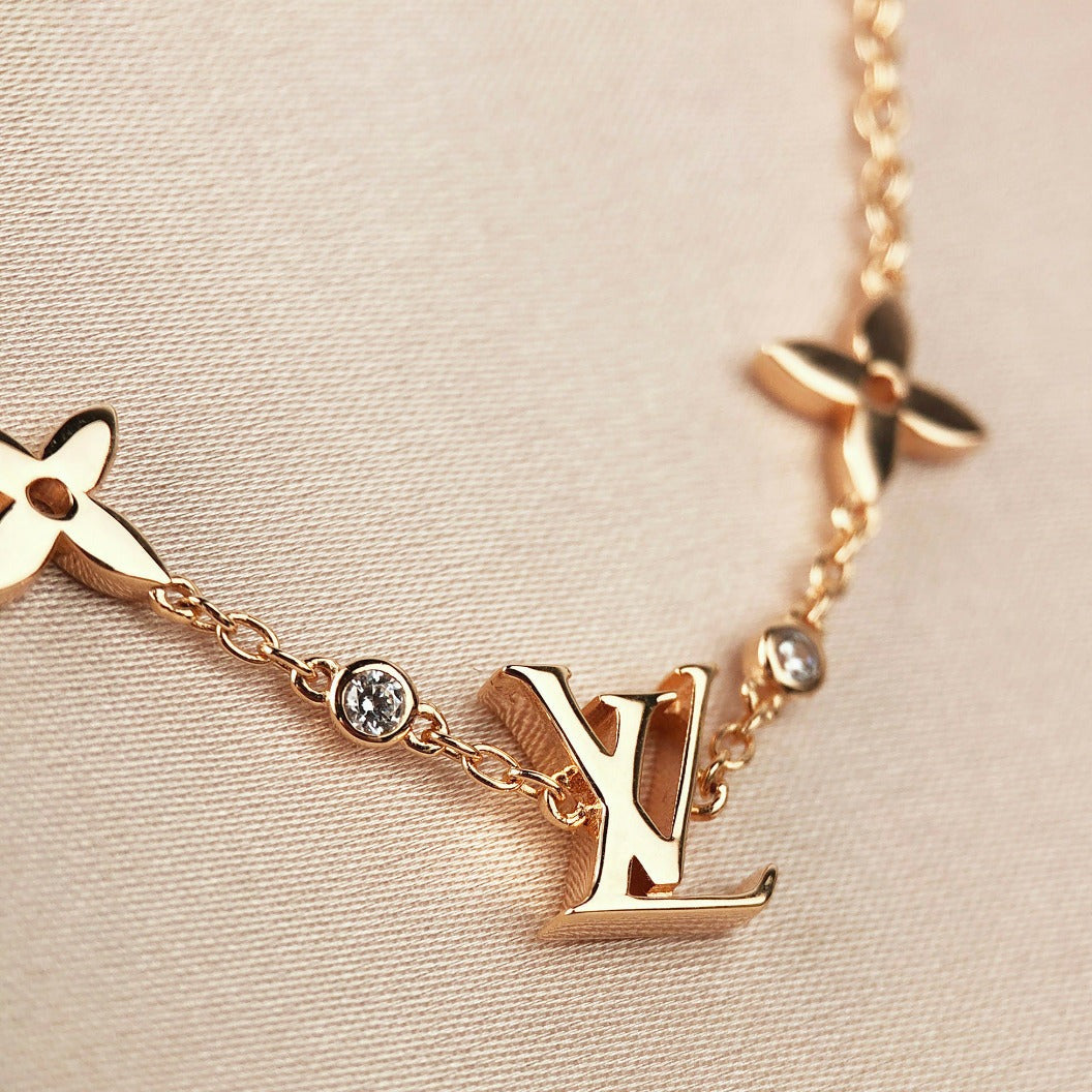 [Olivia JW]STAR AND SUN 7 MOTIFS GOLD BRACELET