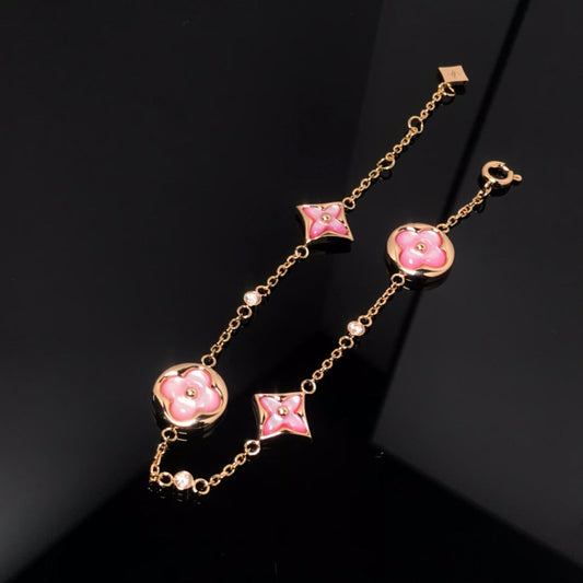 [Olivia JW]STAR AND SUN 4 MOTIF PINK MOP PINK GOLD BRACELET