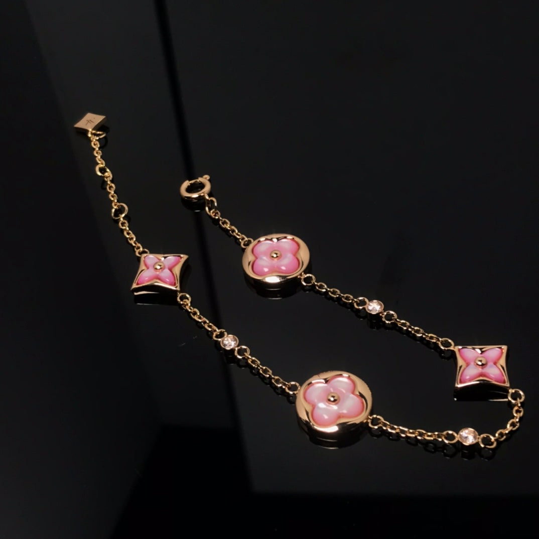 [Olivia JW]STAR AND SUN 4 MOTIF PINK MOP PINK GOLD BRACELET