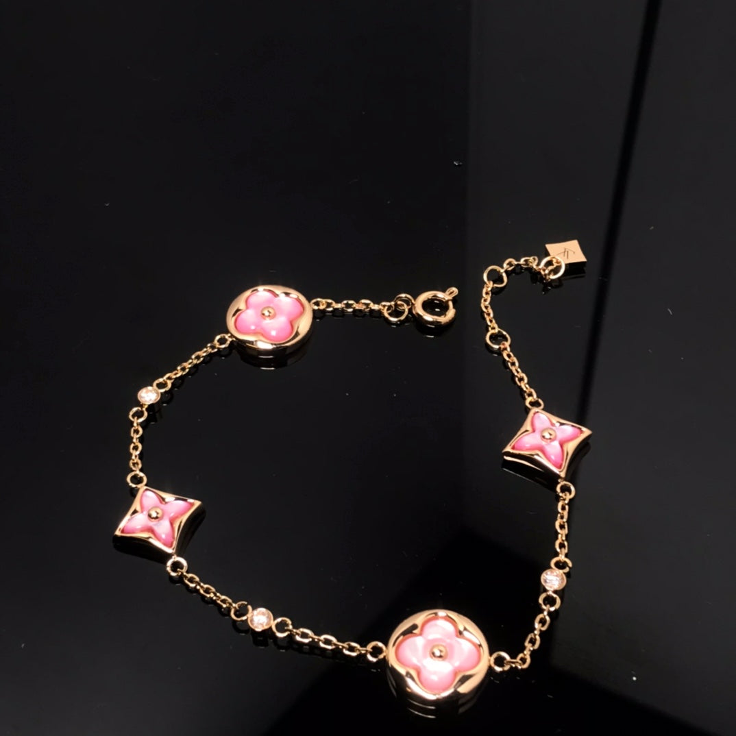 [Olivia JW]STAR AND SUN 4 MOTIF PINK MOP PINK GOLD BRACELET