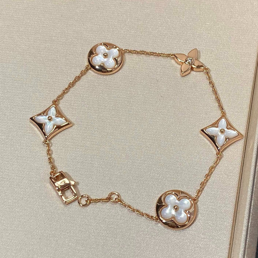 [Olivia JW]STAR AND SUN 5 MOTIF MOP PINK GOLD BRACELET