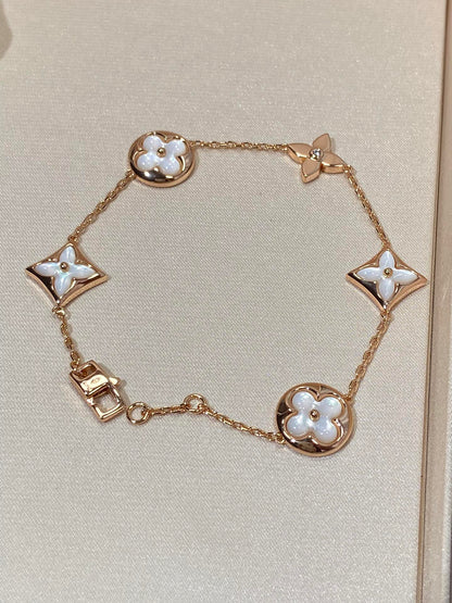 [Olivia JW]STAR AND SUN 5 MOTIF MOP PINK GOLD BRACELET
