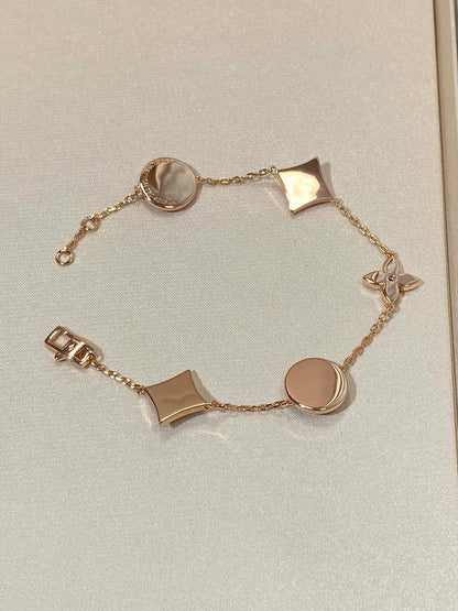 [Olivia JW]STAR AND SUN 5 MOTIF MOP PINK GOLD BRACELET