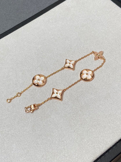 [Olivia JW]STAR AND SUN 5 MOTIF MOP PINK GOLD BRACELET