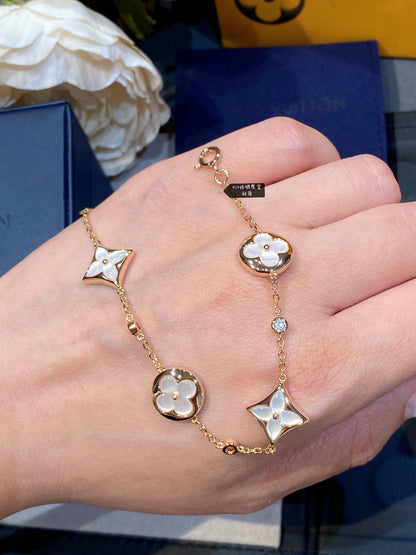 [Olivia JW]STAR AND SUN 4 MOTIF WHITE MOP PINK GOLD BRACELET