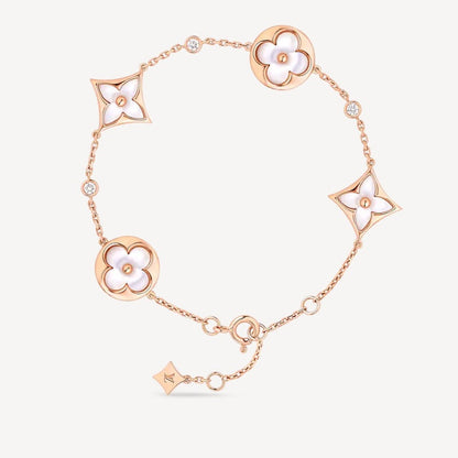 [Olivia JW]STAR AND SUN 4 MOTIF WHITE MOP PINK GOLD BRACELET