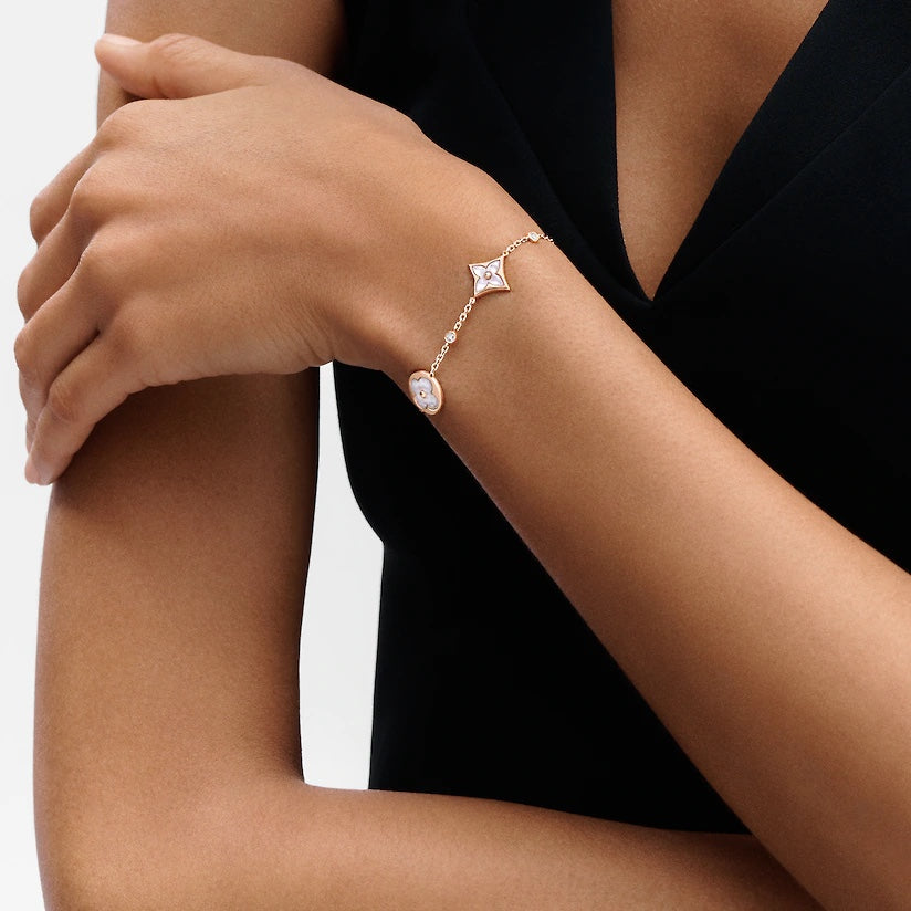 [Olivia JW]STAR AND SUN 4 MOTIF WHITE MOP PINK GOLD BRACELET