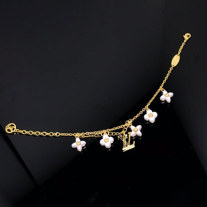 [Olivia JW]LOGO 6 MOTIF STAR AND SUN GOLD BRACELET
