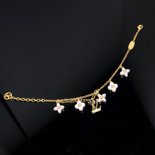 [Olivia JW]LOGO 6 MOTIF STAR AND SUN GOLD BRACELET
