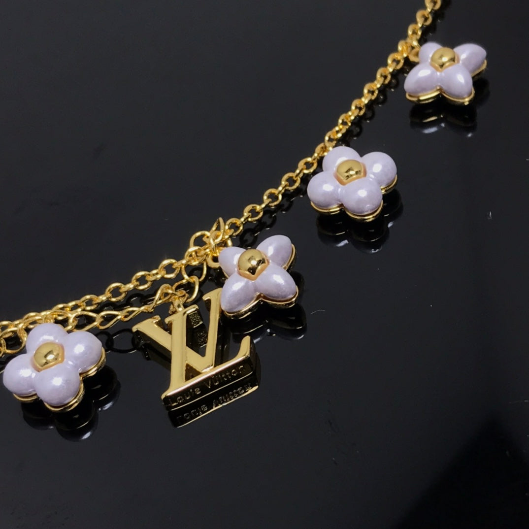 [Olivia JW]LOGO 6 MOTIF STAR AND SUN GOLD BRACELET